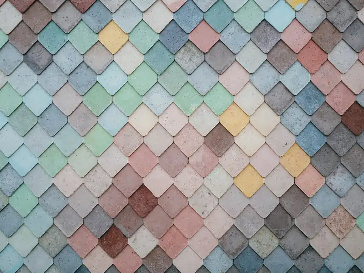 Assortment of richly colored ceramic tiles on display at a showroom